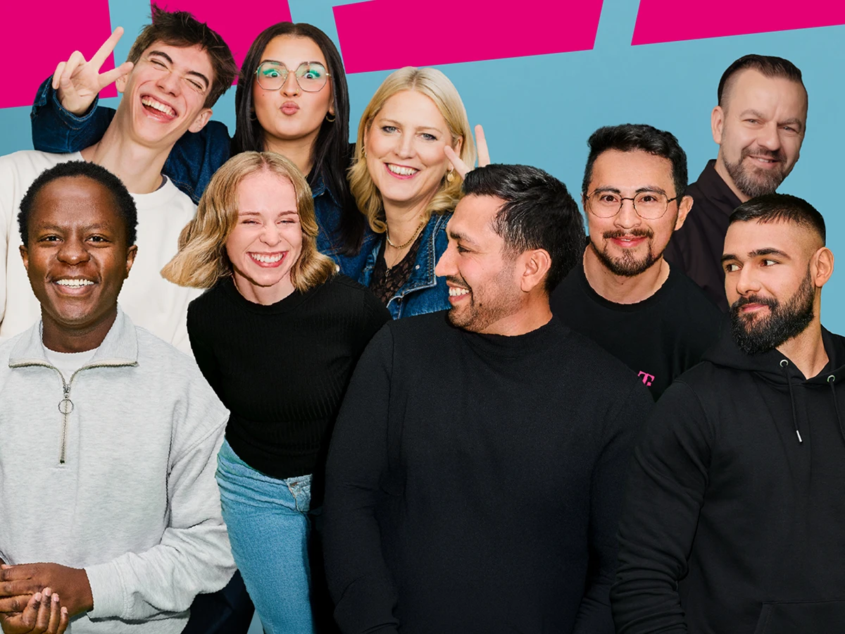 Group photo of several people smiling. (Header Photo)